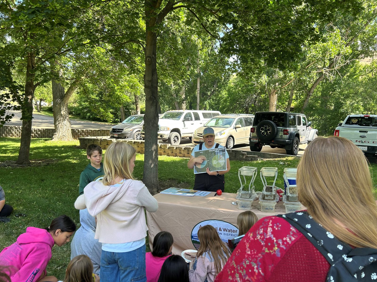 Students gathered for a soil education lesson at outdoor school